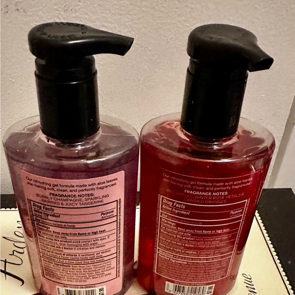 Bath & Body Works Champagne Toast & Red Winter Candy Apple Hand Sanitizer Duo - Picture 2 of 2